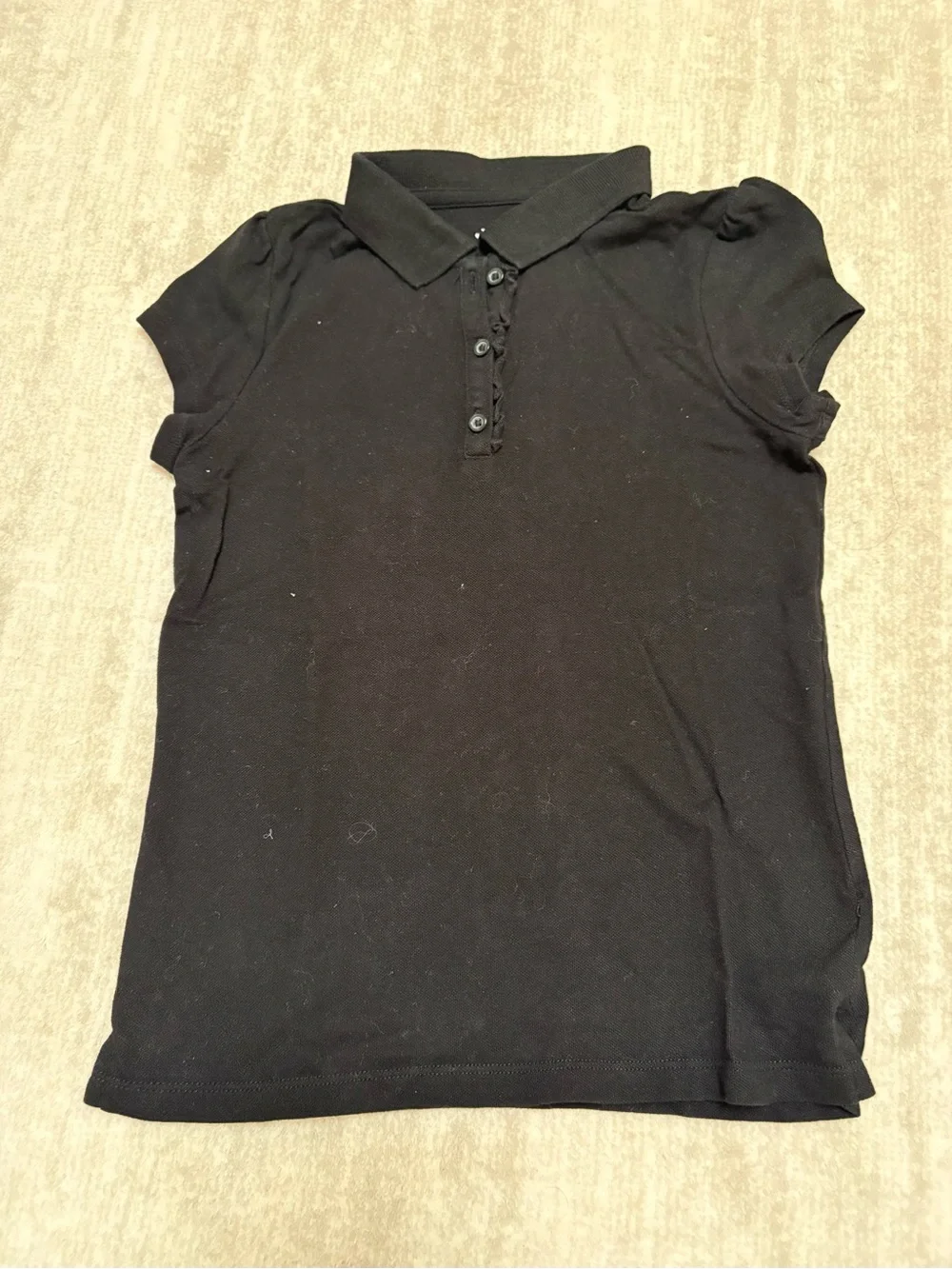 The Children's Place Black Short Sleeve Polo with ruffle trim. Size M (7-8)